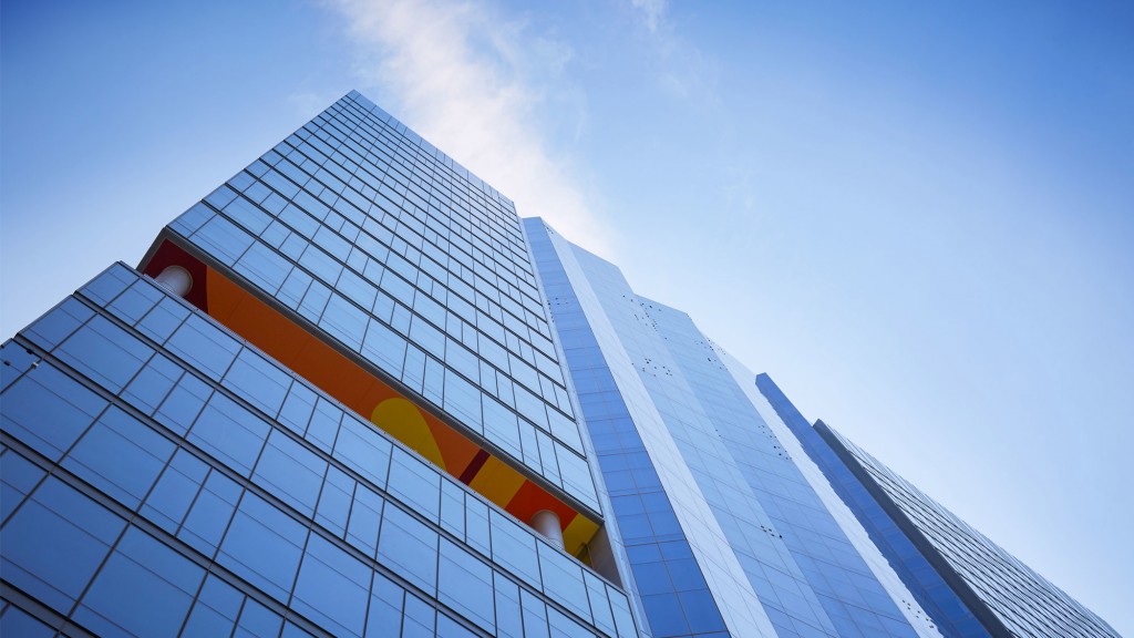 A tall building with a blue sky.